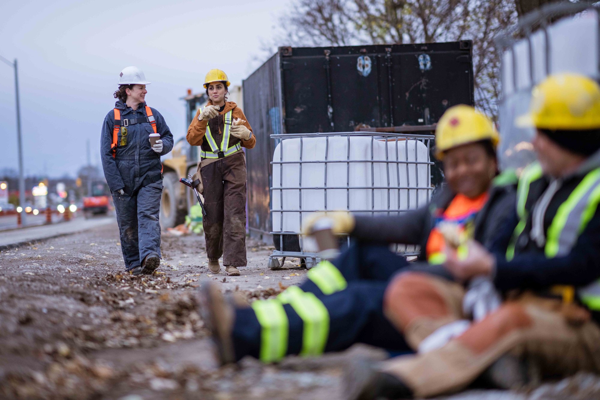 workers-happily-talking-on-break workers-happily-talking-on-break