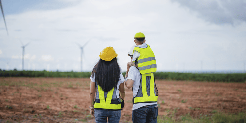 worker-and-family-standing-in-field-family-link-pack