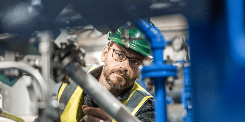 worker-reviewing-machine-sif-shield