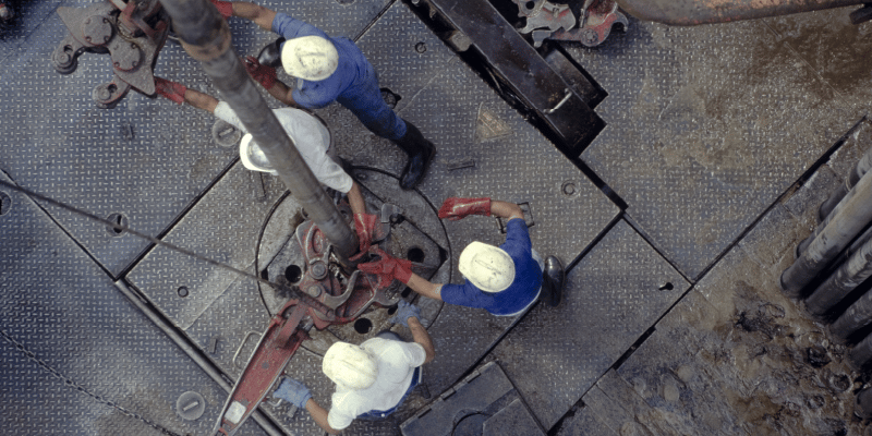 workers-adjusting-machine-moment-of-clarity