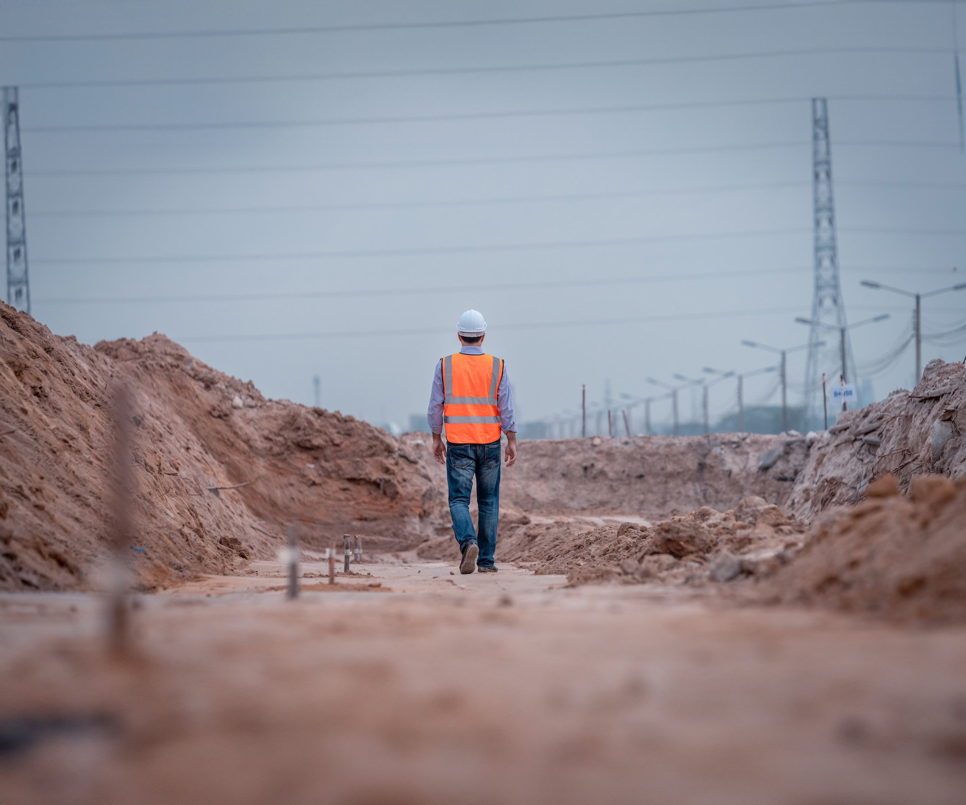 construction-worker-walking-alone construction-worker-walking-alone