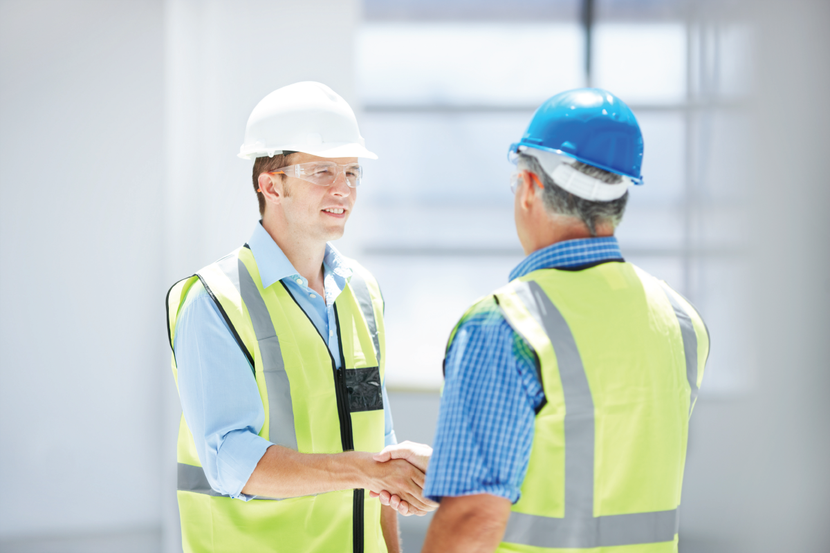 new-worker-shaking hands-with-supervisor
